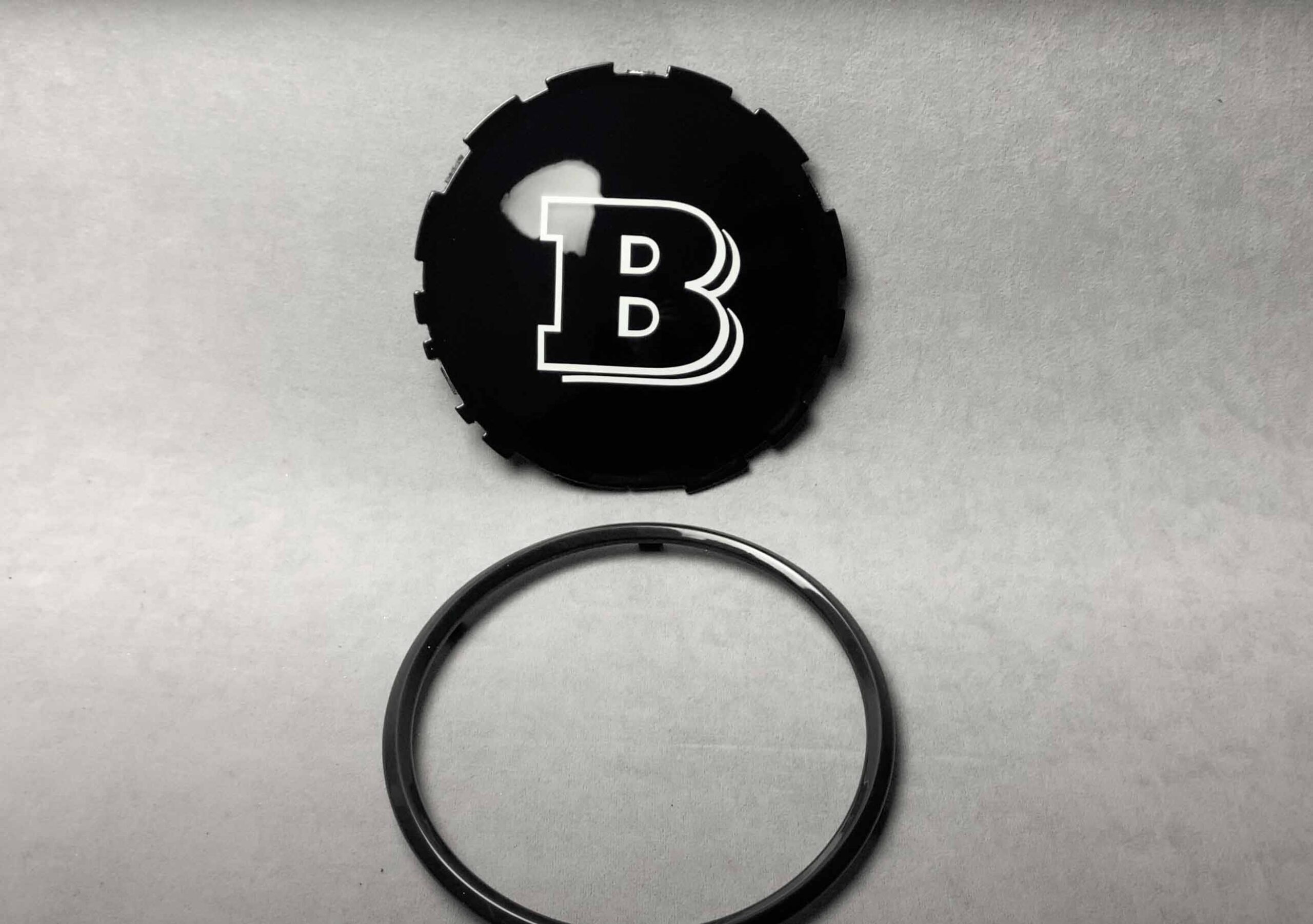 Brabus front grill badge black plastic plate B on Mercedes G Class