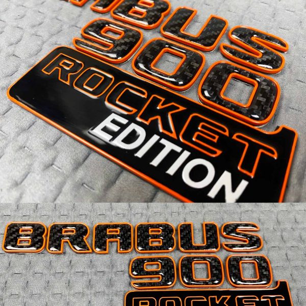Carbon Brabus 900 Rocket Edition logo with orange trim for Mercedes G Class trunk