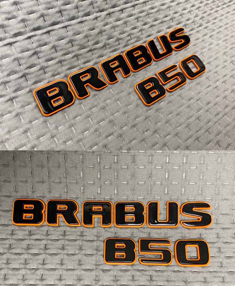 Black metal Brabus B50 rear badge with orange trim for Mercedes S Class trunk
