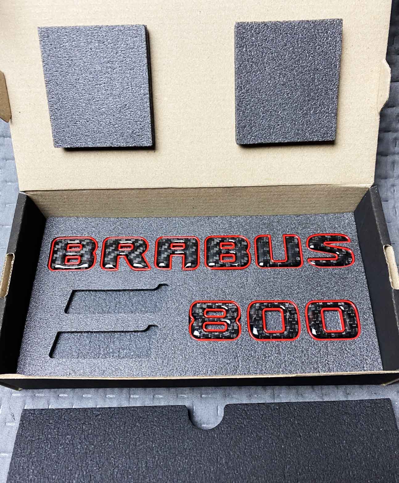 Brabus 800 Carbon fiber rear logo with red trim for Mercedes G Class trunk Brabus 800 Carbon fiber rear logo with red trim for Mercedes G Class trunk