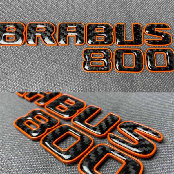 Tail Brabus 800 carbon badges with orange trim for G-Wagon