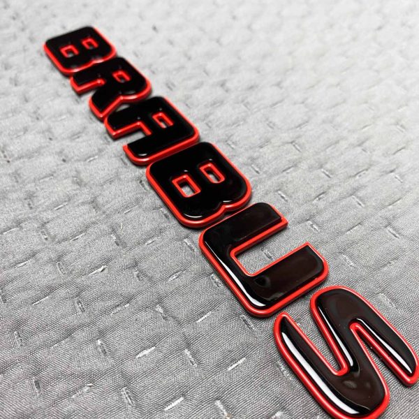 Metal black Brabus logo with red trim for Mercedes Benz G Class trunk